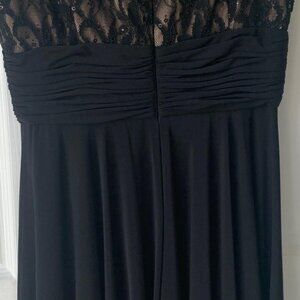 Beautiful black lace 8P party dress with sequin touches.